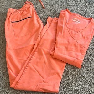Matrix impulse size xsmall scrub top and xs pants, worn twice. Like new.